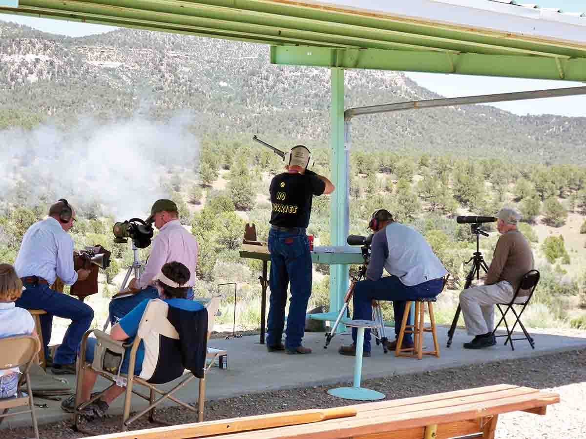 Although BPCRs only launch bullets at 1,100 to 1,300 fps, they still deliver plenty of felt recoil. This shooter at a BPCR match was photographed with his rifle in full recoil.